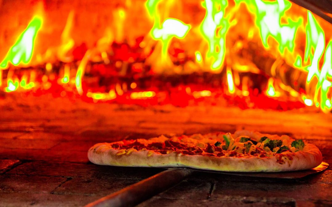 La magie des pizzas cuites au feu de bois : découvrez notre four traditionnel dans notre pizzeria italienne à Molsheim